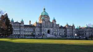 An image of the BC Legislature building on a sunny day.